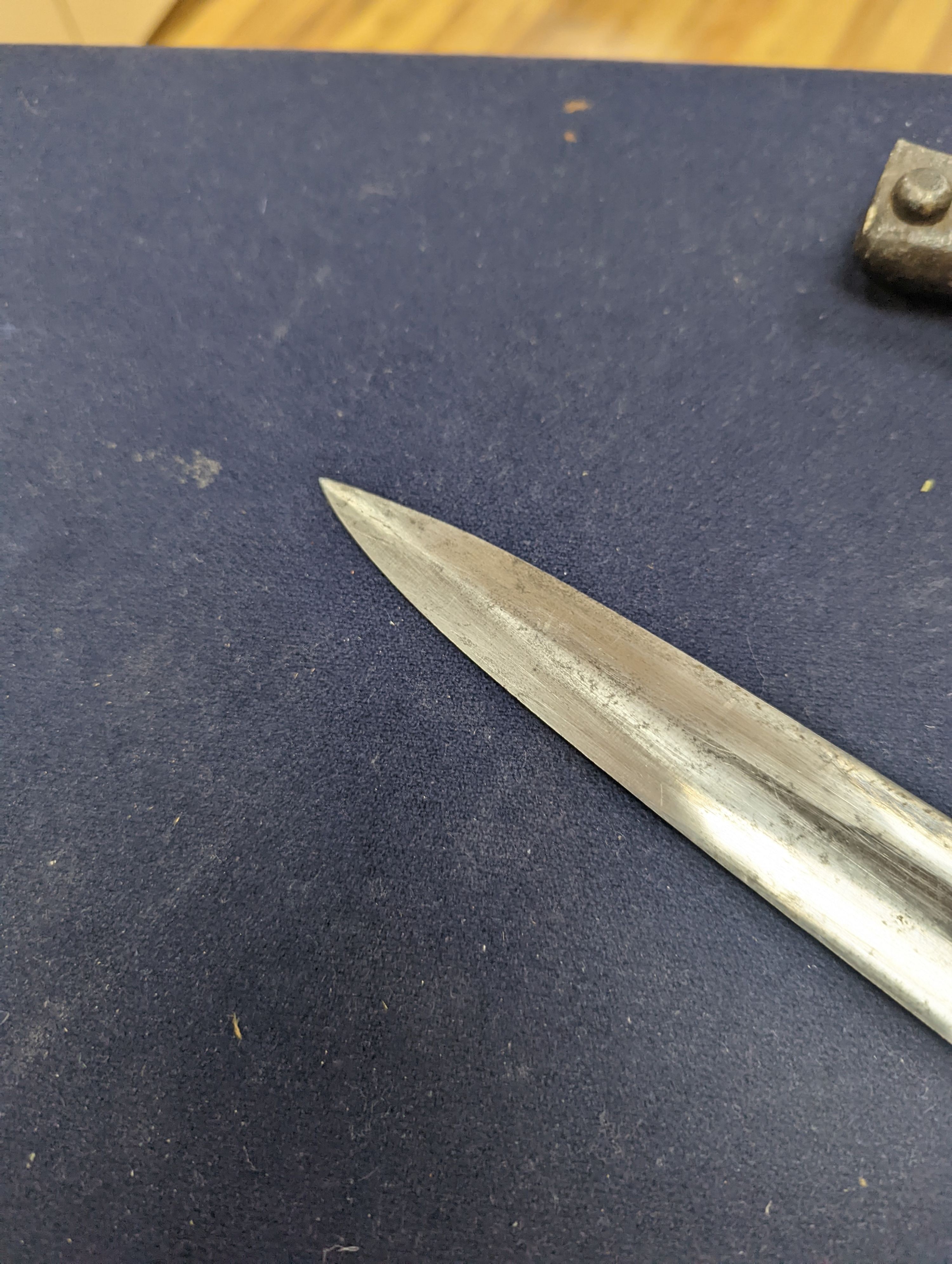 A Third Reich SA dagger within sheath, blade 22cm., and a bayonet within scabbard